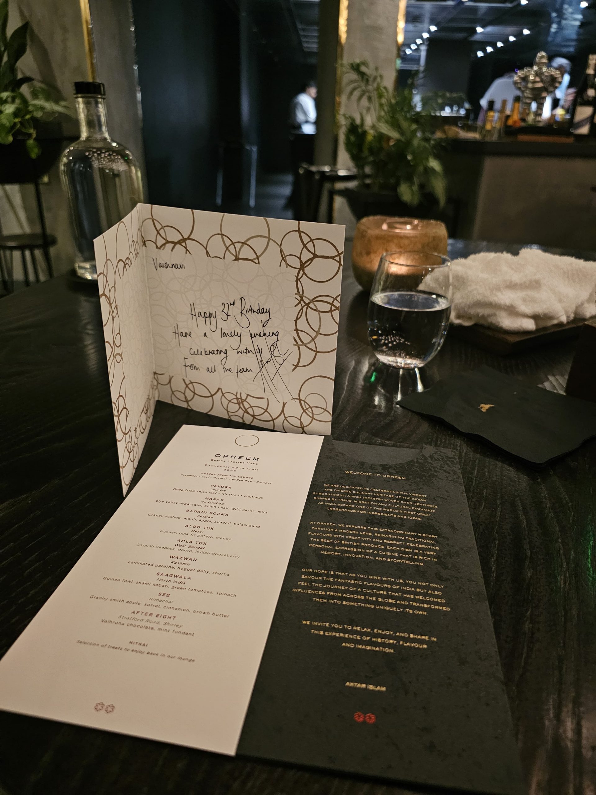 The Opheem Spring Tasting Menu and welcome card alongside the personalised birthday note